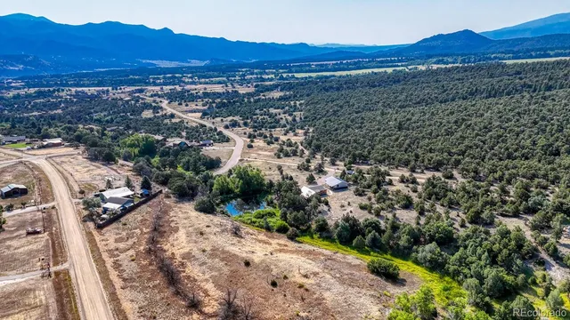 a view of a city with mountain