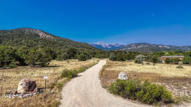 a view of a yard with mountain