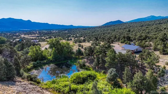 a view of a city with mountains in the background