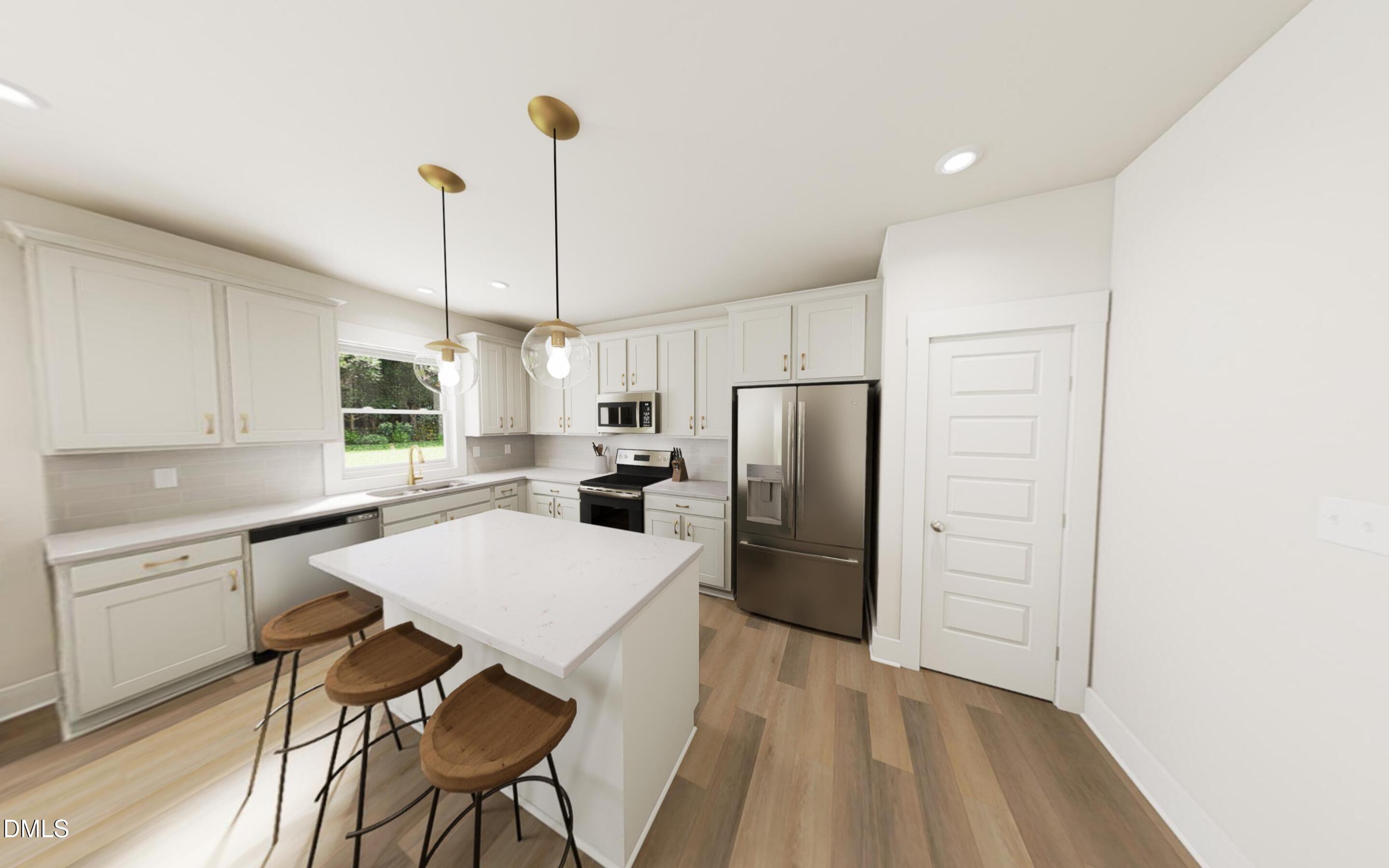 2015 Pollinator Place Mebane, NC 27302 - Photo 3 of 24 a kitchen with stainless steel appliances a refrigerator a sink a stove a dining table and chairs