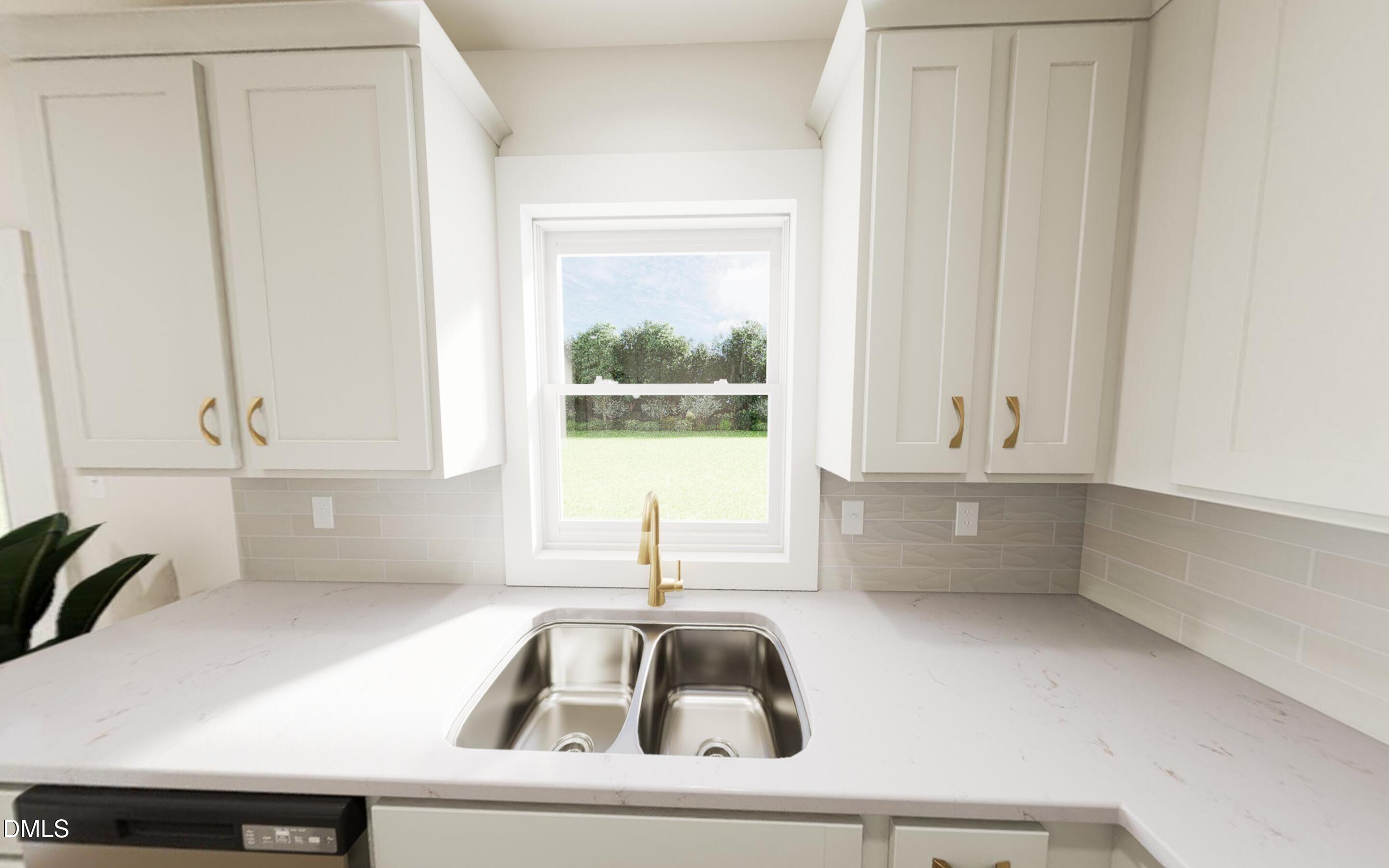2015 Pollinator Place Mebane, NC 27302 - Photo 4 of 24 a kitchen with a sink a window and a vanity