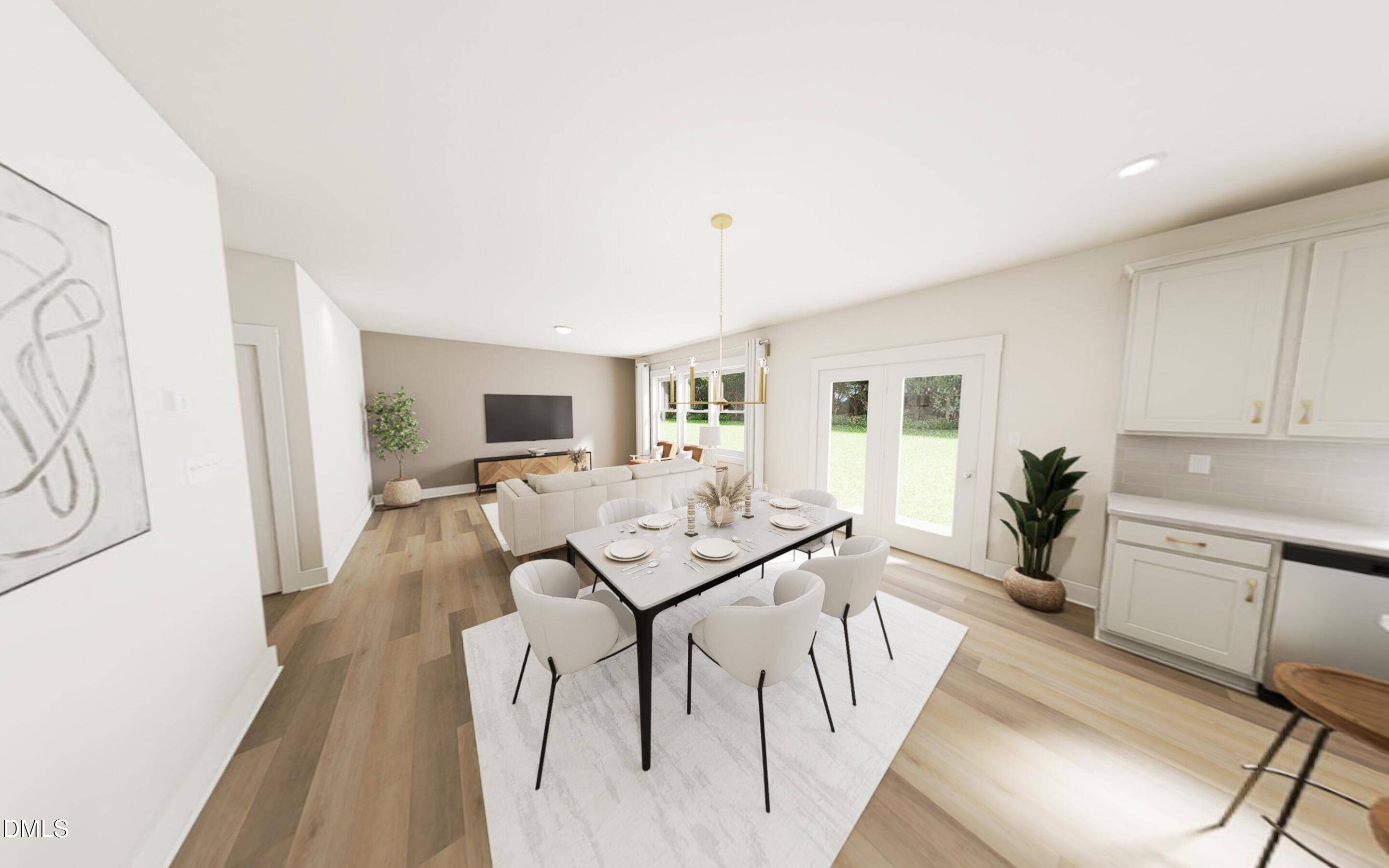 2015 Pollinator Place Mebane, NC 27302 - Photo 5 of 24 a living room with furniture a dining table and chairs with wooden floor