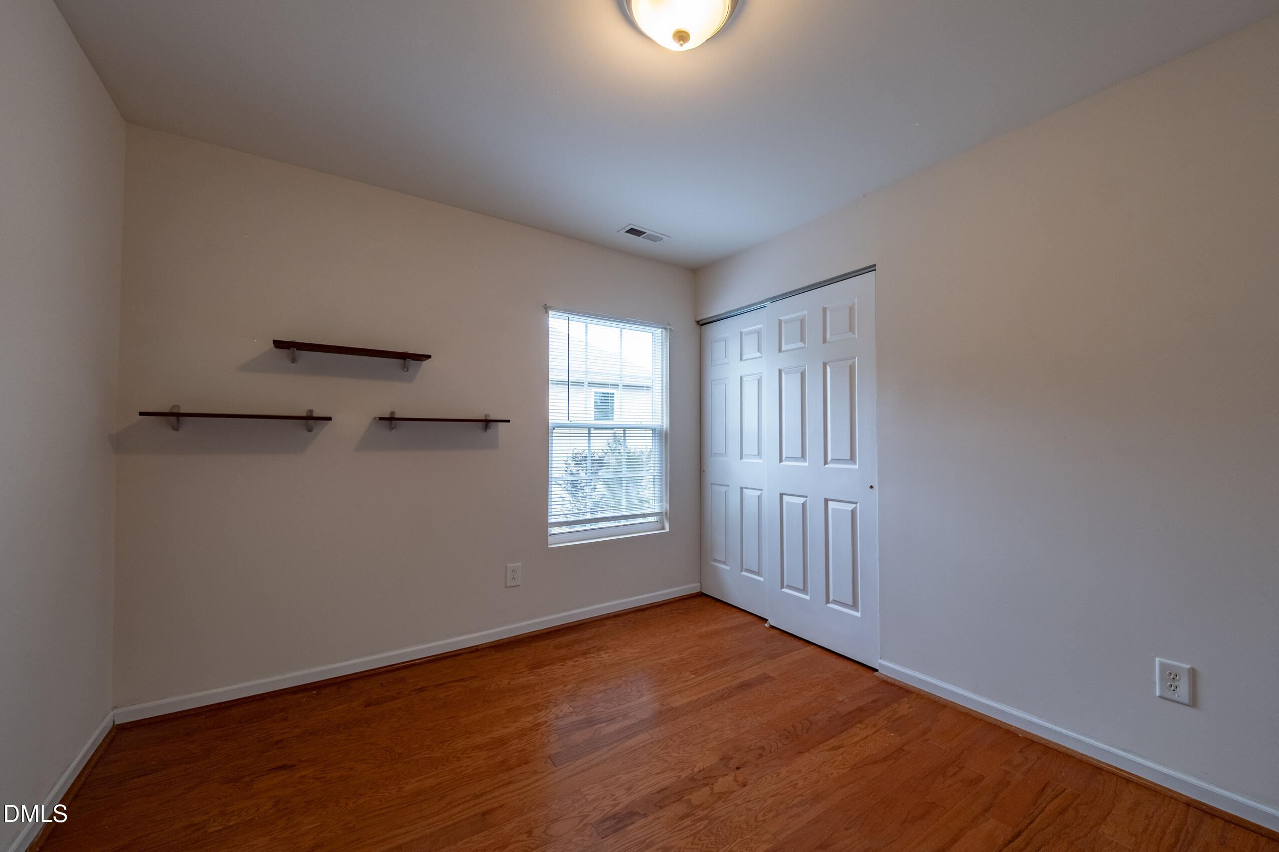 719 Obsidian Way Durham, NC 27703 - Photo 27 of 41 a view of an empty room with a window