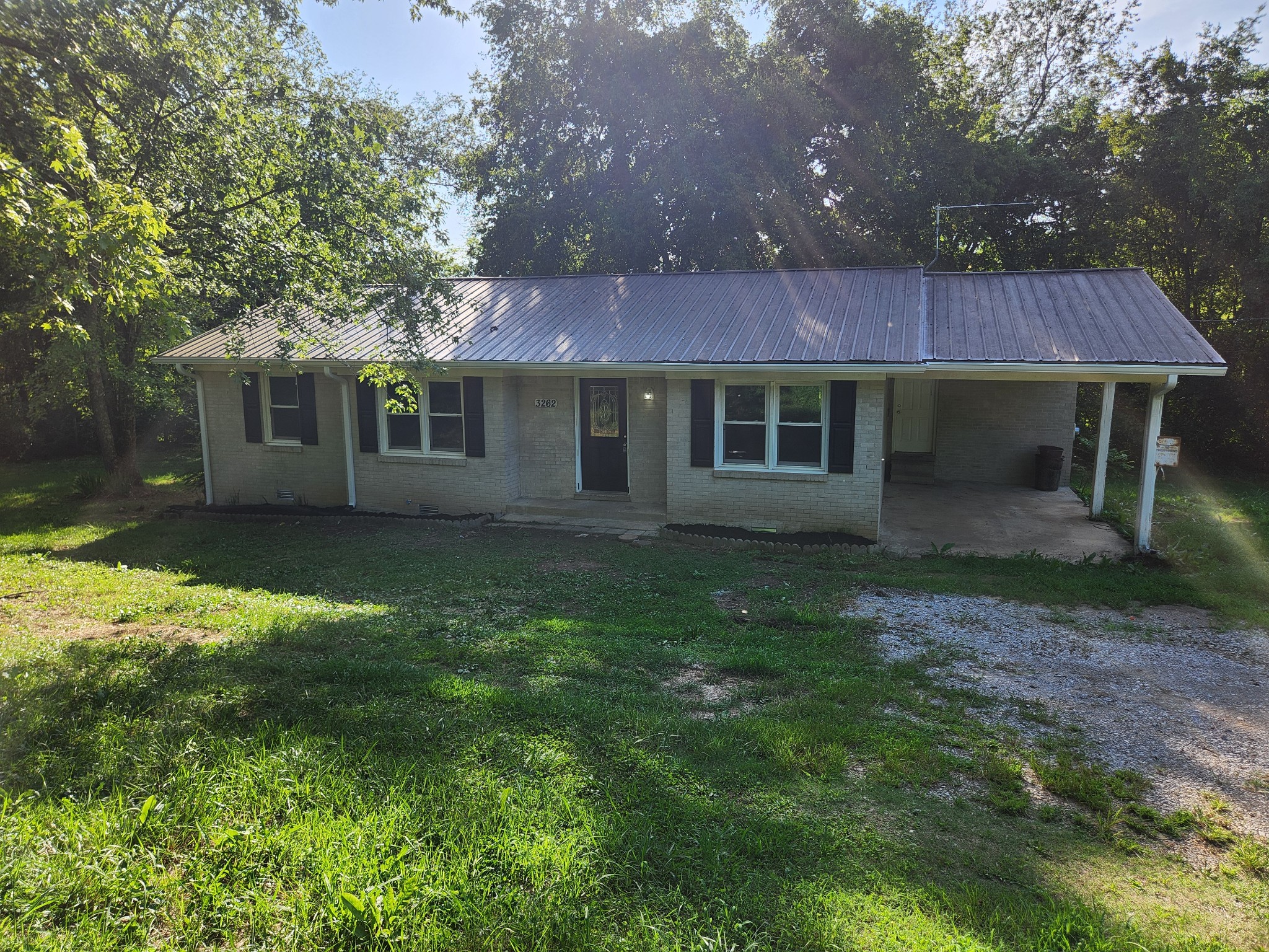3262 Prospect Road Pulaski, TN 38478 - Photo 1 of 23 a view of a house with a yard