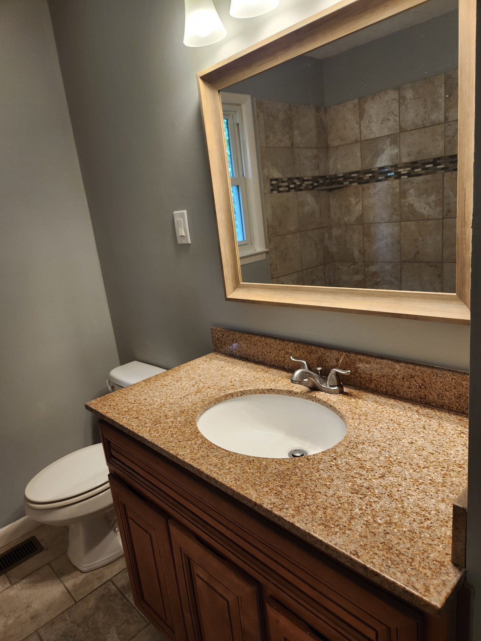 3262 Prospect Road Pulaski, TN 38478 - Photo 11 of 23 a bathroom with a granite countertop sink and a mirror