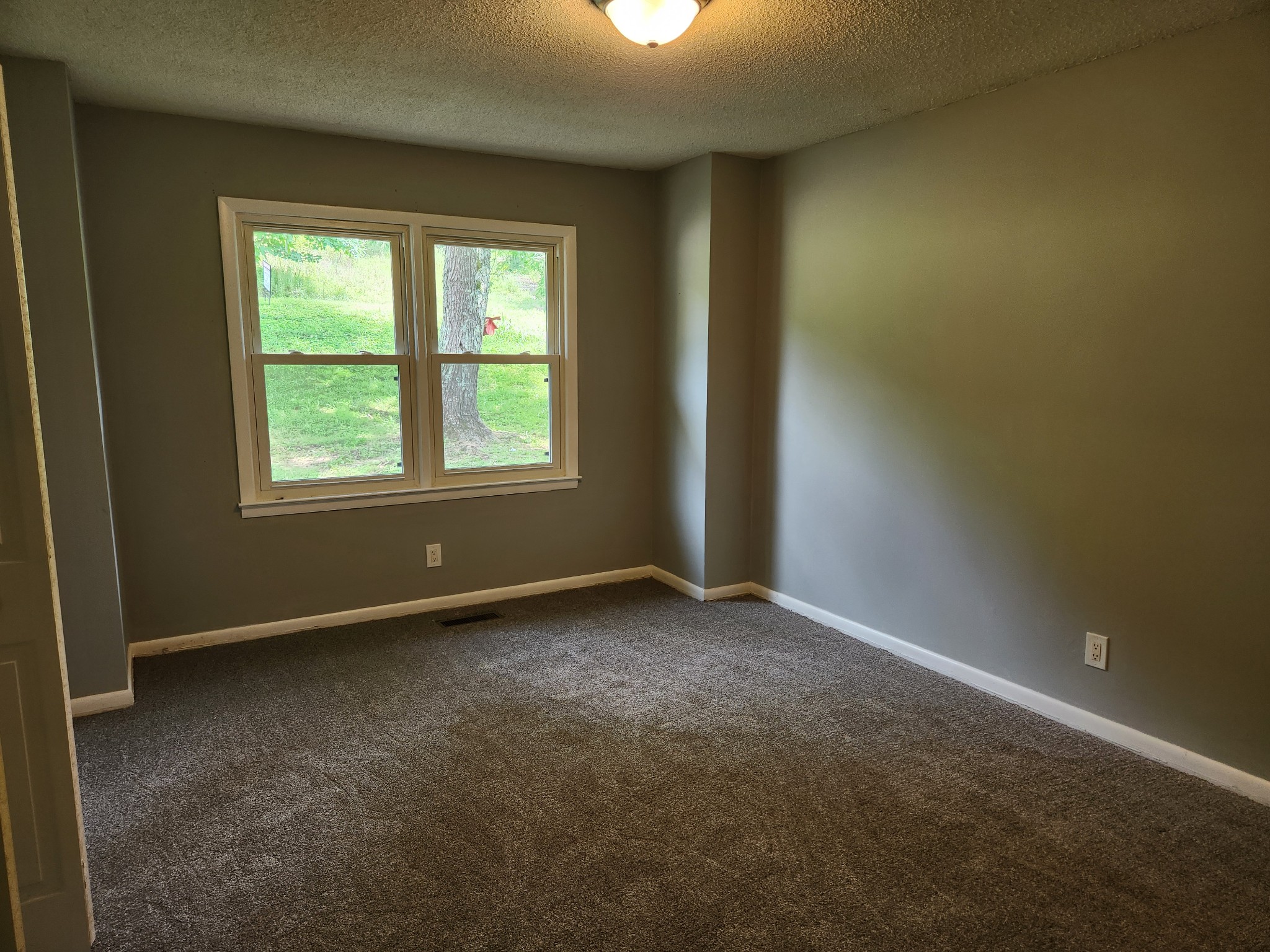 3262 Prospect Road Pulaski, TN 38478 - Photo 18 of 23 an empty room with a window