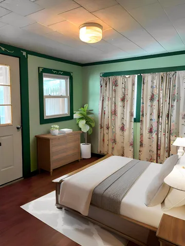 a living room with furniture and window