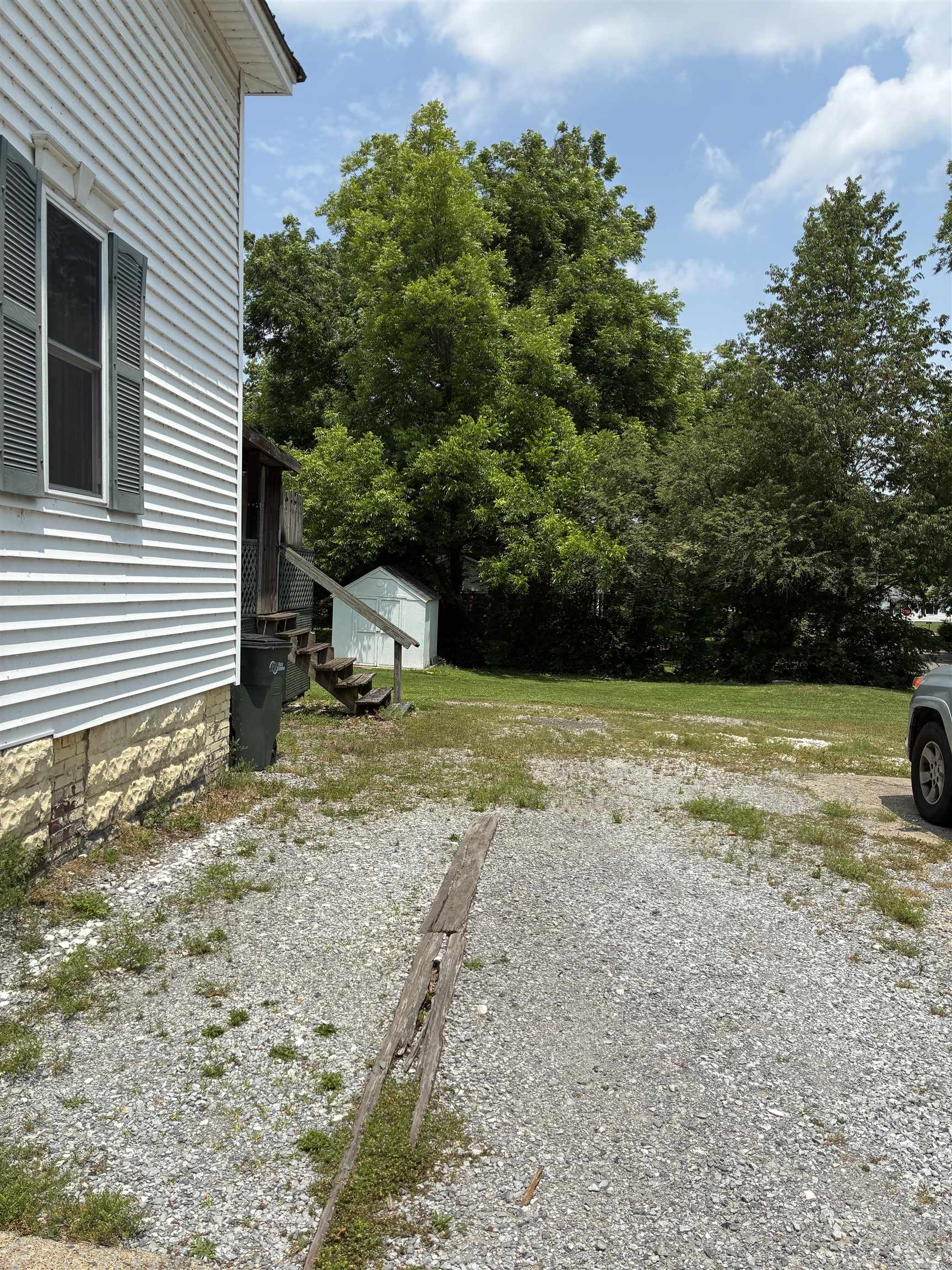 408 East Main Street Newbern, TN 38059 - Photo 28 of 30 a view of a backyard with a garden
