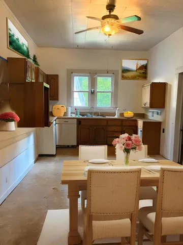 a living room with a couch and a fireplace