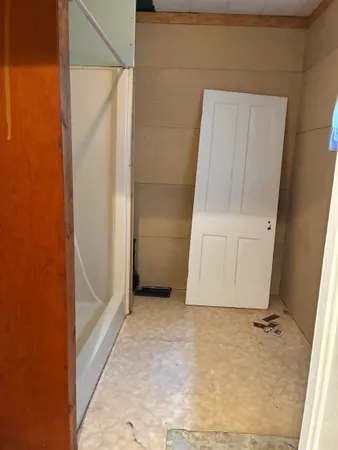a utility room with washer and dryer