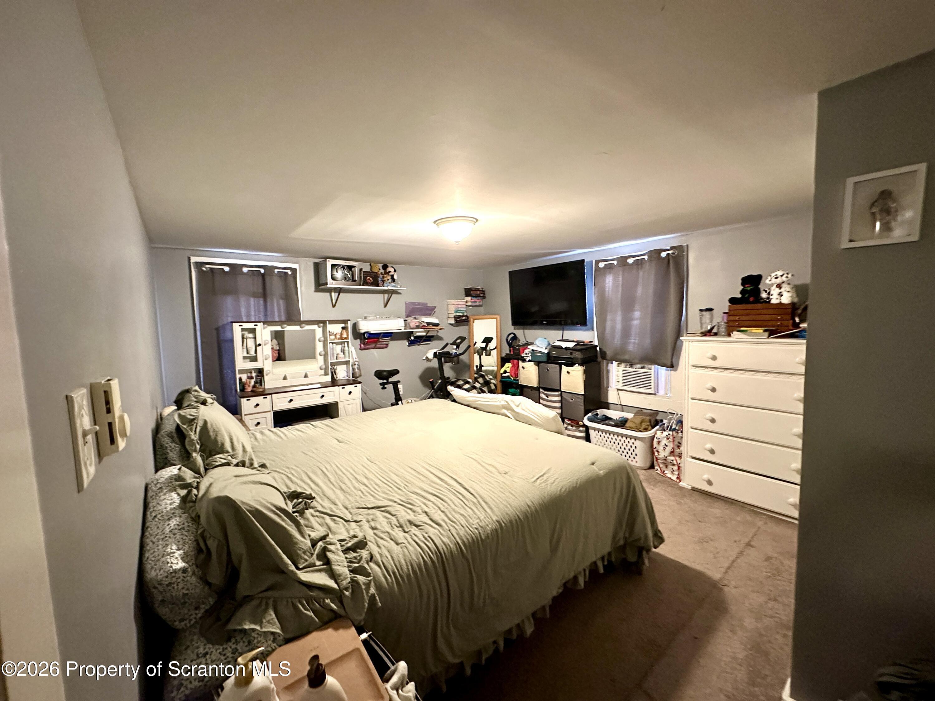 544 Green Street Duryea, PA 18642 - Photo 12 of 14 a bedroom with a bed and a tv