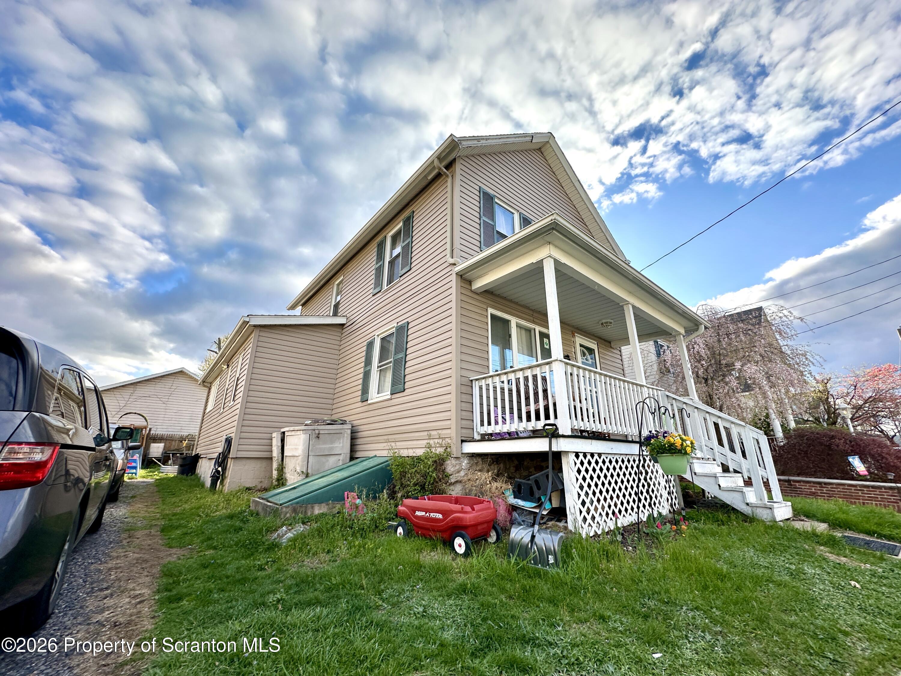544 Green Street Duryea, PA 18642 - Photo 14 of 14 a view of a house with a yard