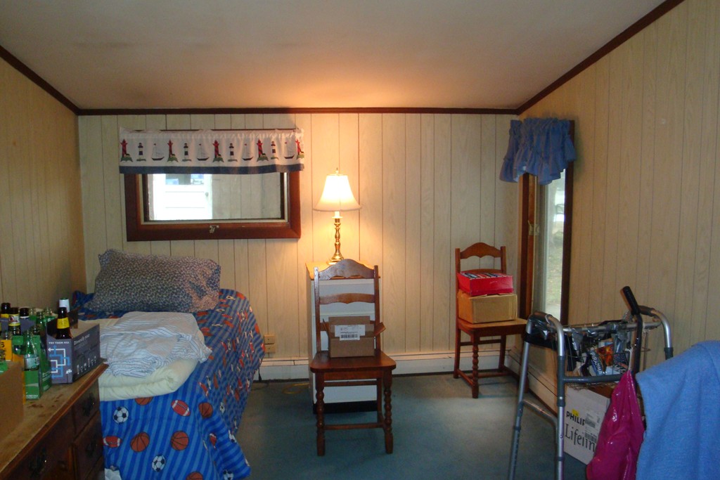 379 Townsend Harbor Road Lunenburg, MA 01462 - Photo 20 of 21 a living room with furniture and a window