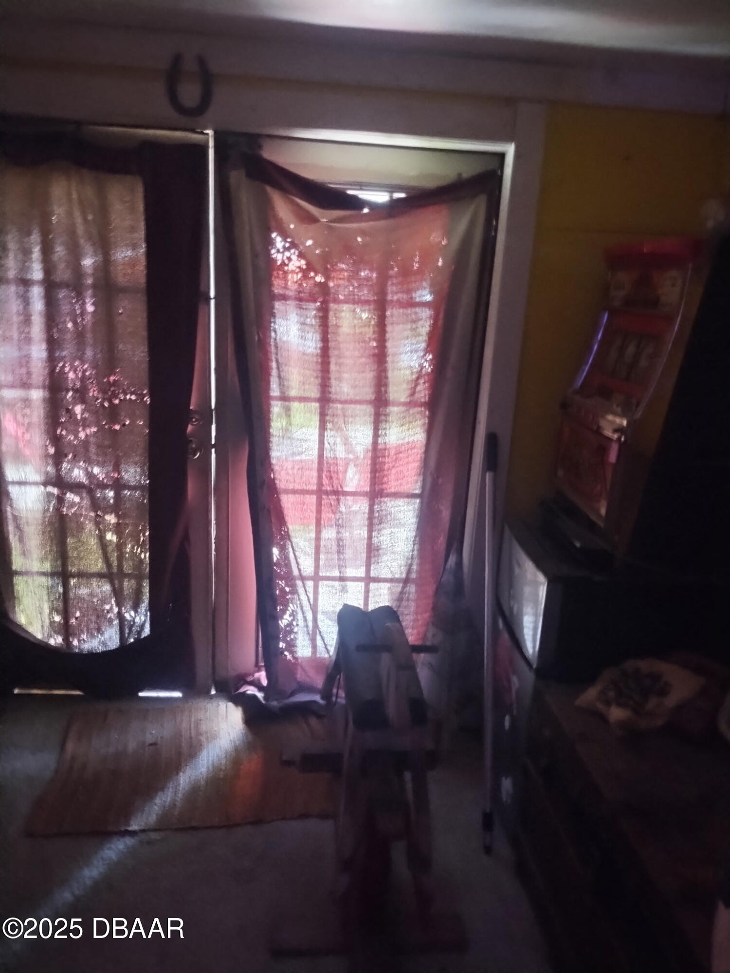 56337 Blue Creek Road Astor, FL 32102 - Photo 11 of 22 a view of livingroom with furniture and a window