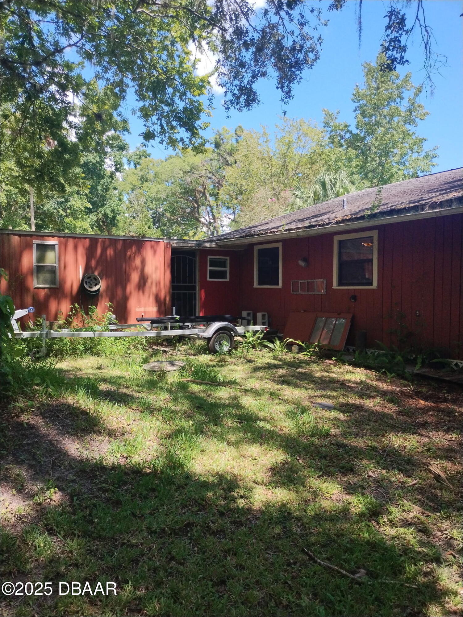 56337 Blue Creek Road Astor, FL 32102 - Photo 17 of 22 a view of house with yard and green space