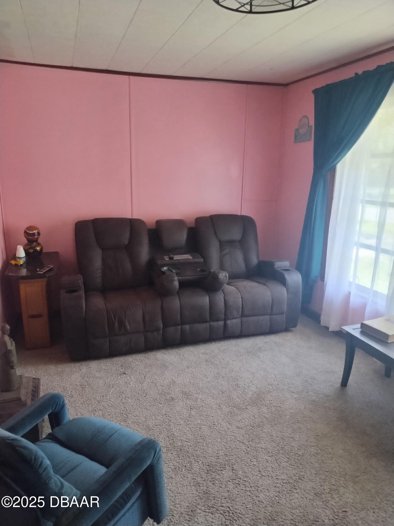 56337 Blue Creek Road Astor, FL 32102 - Photo 5 of 22 a living room with furniture and a window