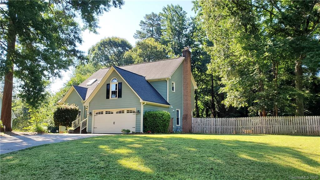 20700 Willow Pond Road Cornelius, NC 28031 - Photo 2 of 47 a house that has a big yard
