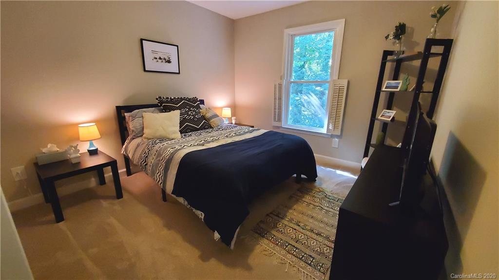 20700 Willow Pond Road Cornelius, NC 28031 - Photo 37 of 47 a bedroom with bed and a window
