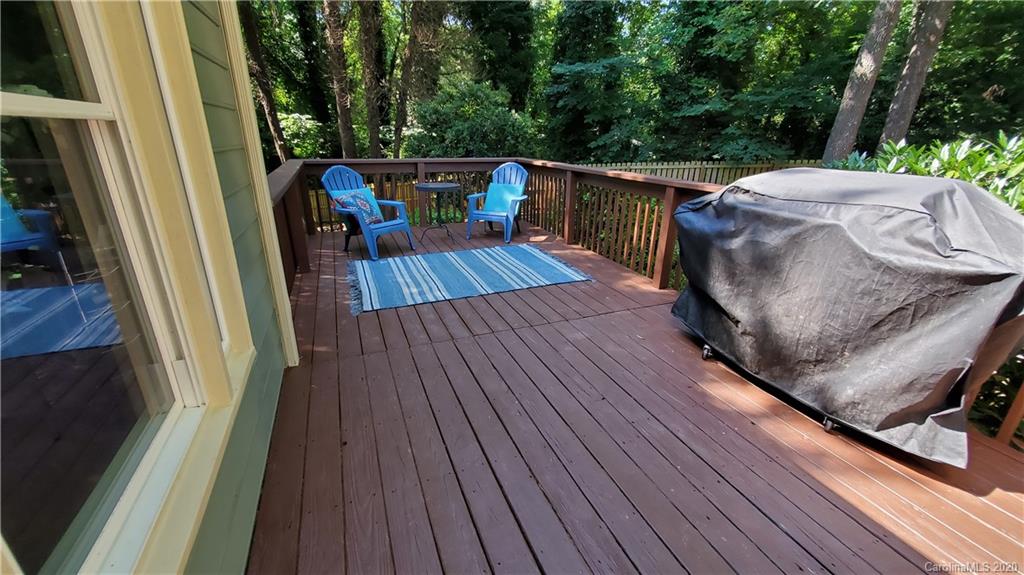 20700 Willow Pond Road Cornelius, NC 28031 - Photo 38 of 47 a balcony with wooden floor stairs and furniture