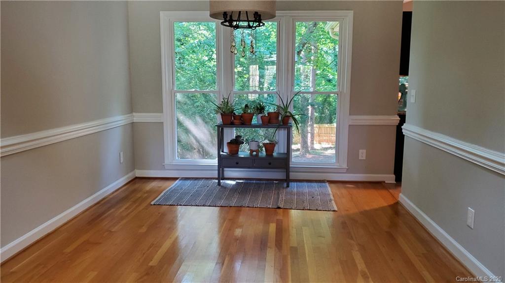 20700 Willow Pond Road Cornelius, NC 28031 - Photo 9 of 47 a living room with wooden floor