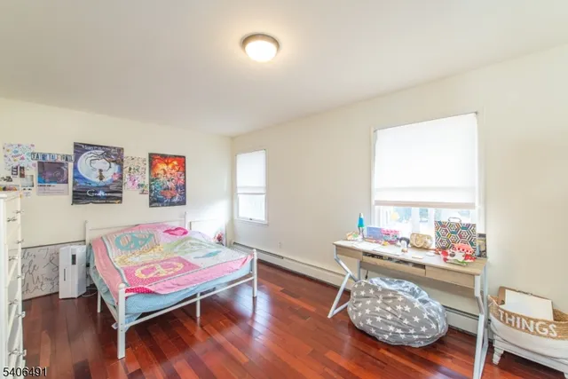 a room with furniture and a wooden floor