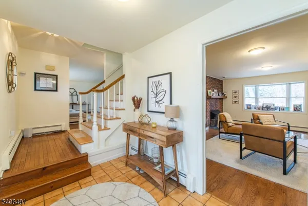 a living room with furniture and a table