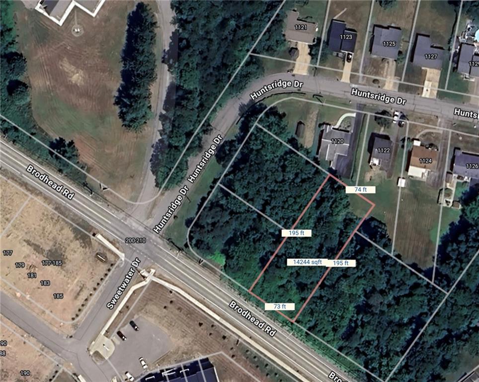 Lot 3 Brodhead Road Crescent, PA 15046 - Photo 2 of 7 an aerial view of a residential apartment building with a yard