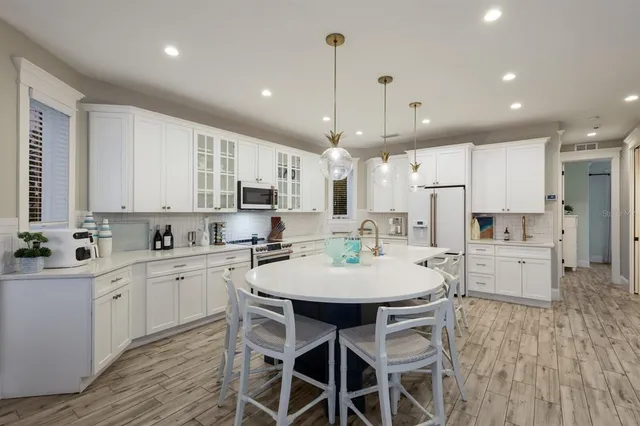 a view of balcony with wooden floor