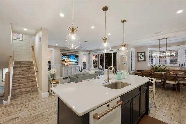 a bathroom with a toilet a sink a mirror and vanity