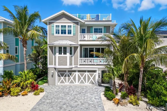 a view of a street with a building in the background