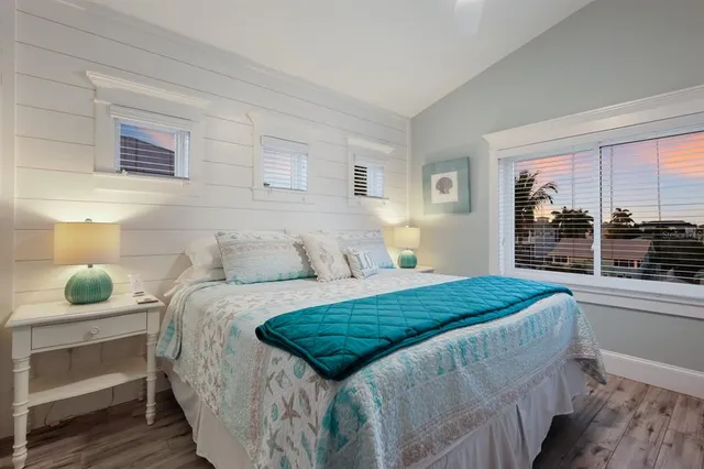 a view of a house with swimming pool and sitting area