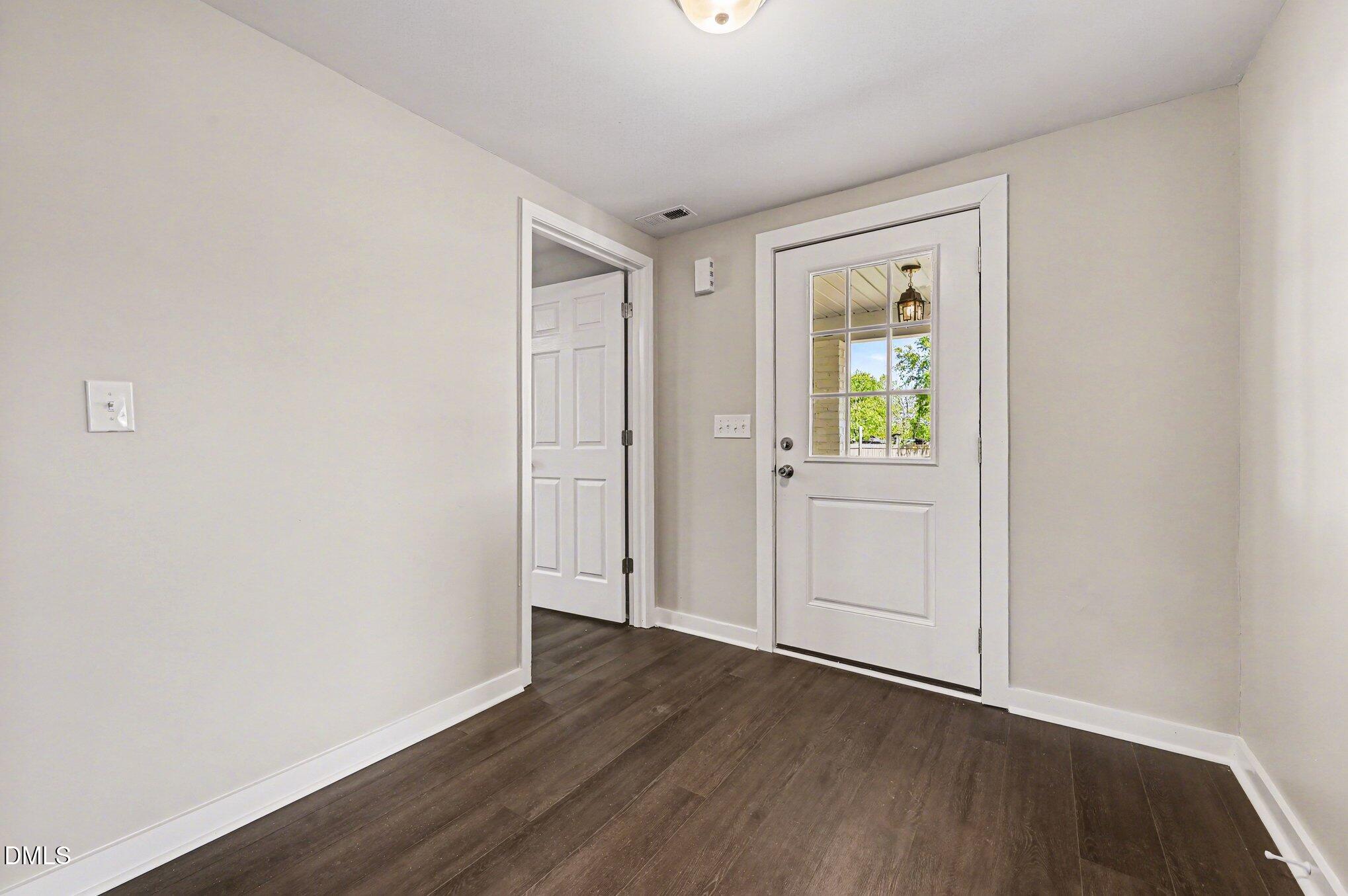 1325 Charlie Carr Road Roxboro, NC 27574 - Photo 10 of 31 wooden floor in an empty room