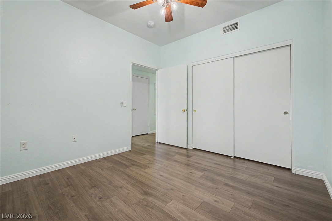 2153 Quarry Ridge Street, Unit 103 Las Vegas, NV 89117 - Photo 26 of 42 Functional bedroom with durable flooring, ready for your personal touch.