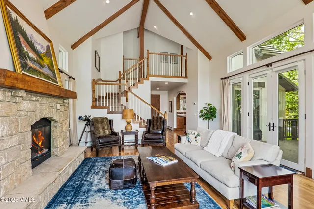 a view of balcony with wooden floor and outdoor seating