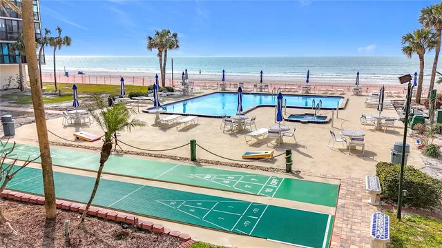 a view of a swimming pool with a bench