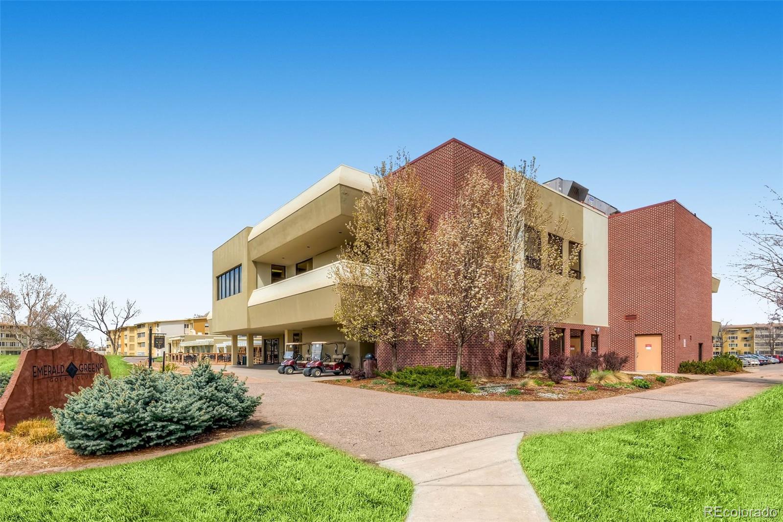625 South Clinton Street, Unit 7B Denver, CO 80247 - Photo 15 of 22 a view of a building with a yard