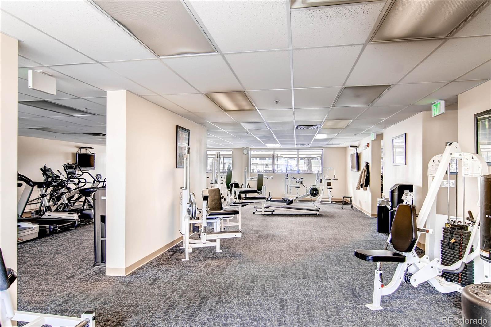 625 South Clinton Street, Unit 7B Denver, CO 80247 - Photo 18 of 22 a view of a room with gym equipment