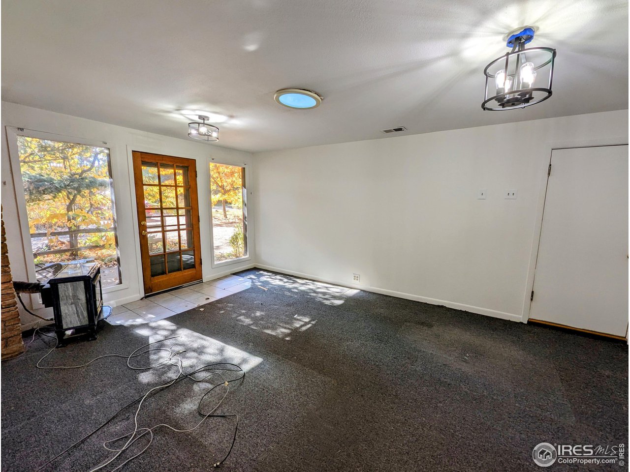 1951 Vista Drive Boulder, CO 80304 - Photo 15 of 35 a view of livingroom with furniture and windows