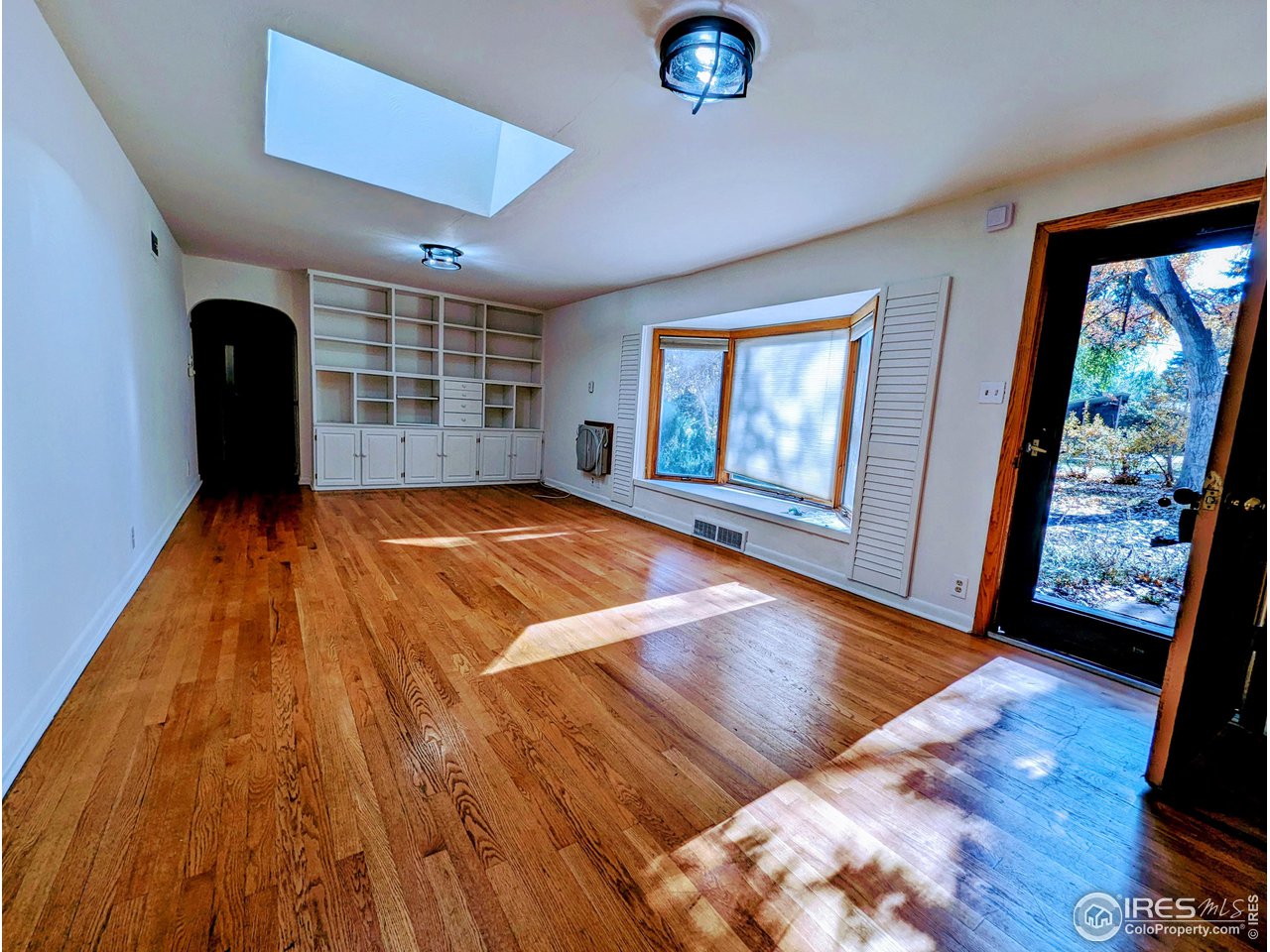 1951 Vista Drive Boulder, CO 80304 - Photo 21 of 35 a view of a livingroom with wooden floor and window