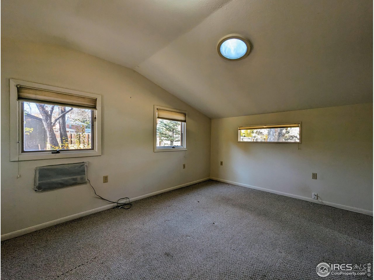 1951 Vista Drive Boulder, CO 80304 - Photo 25 of 35 a view of an empty room with a window
