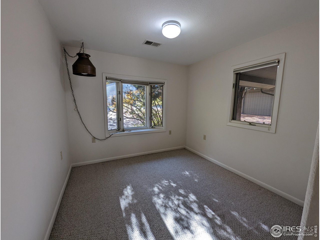 1951 Vista Drive Boulder, CO 80304 - Photo 26 of 35 an empty room with windows