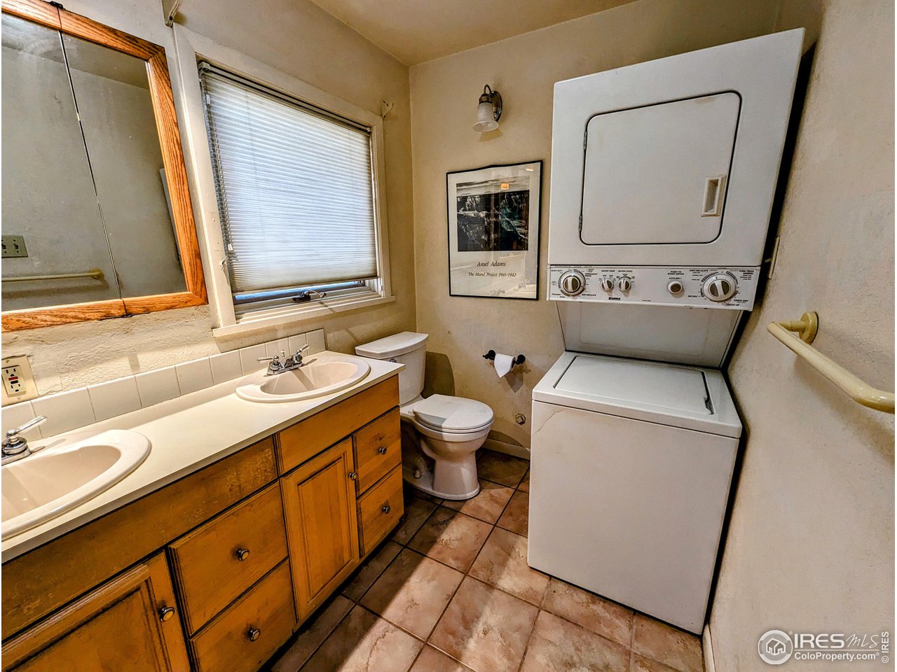1951 Vista Drive Boulder, CO 80304 - Photo 35 of 35 a bathroom with a toilet sink and mirror