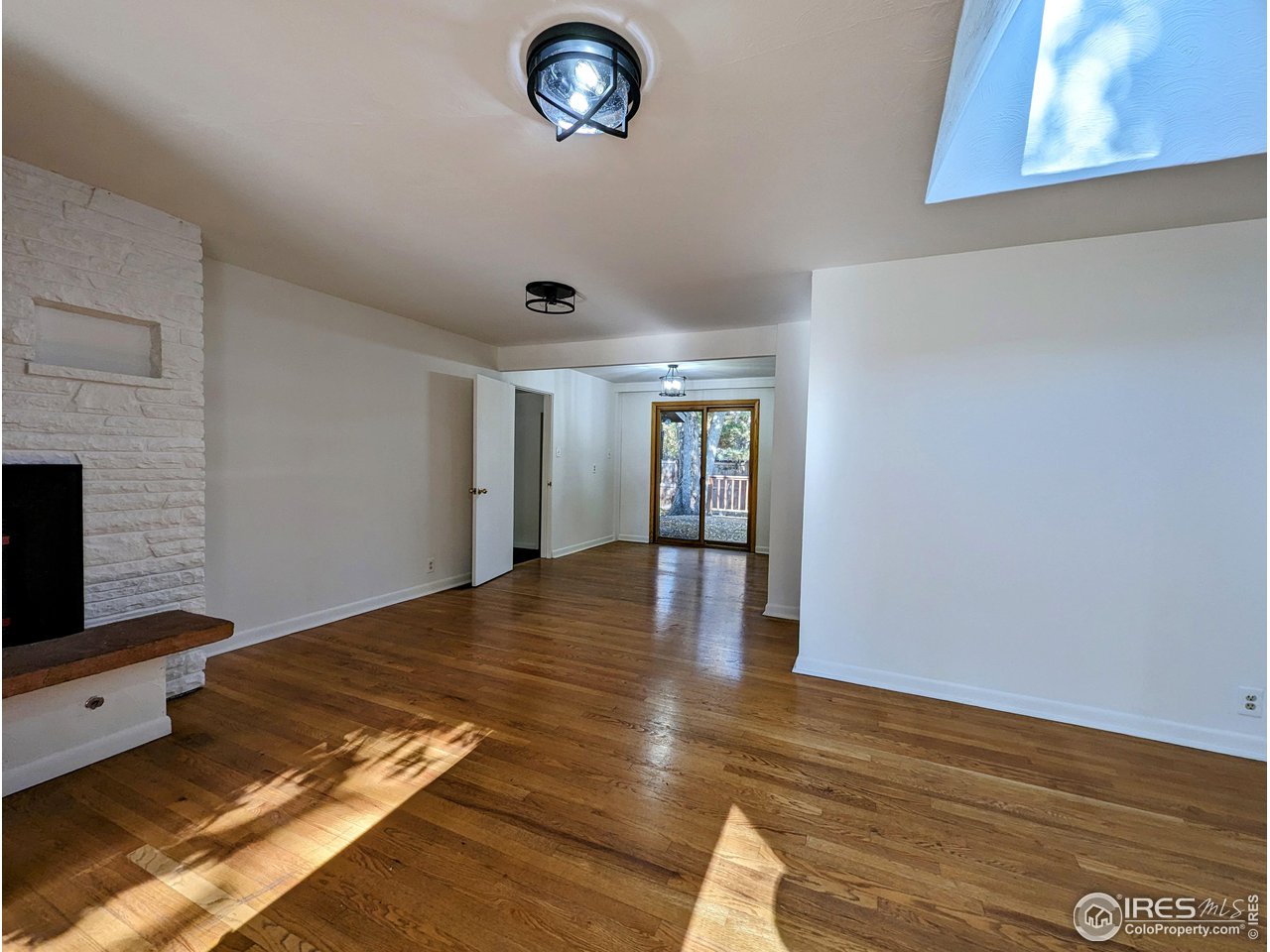1951 Vista Drive Boulder, CO 80304 - Photo 4 of 35 a view of livingroom and hardwood floor