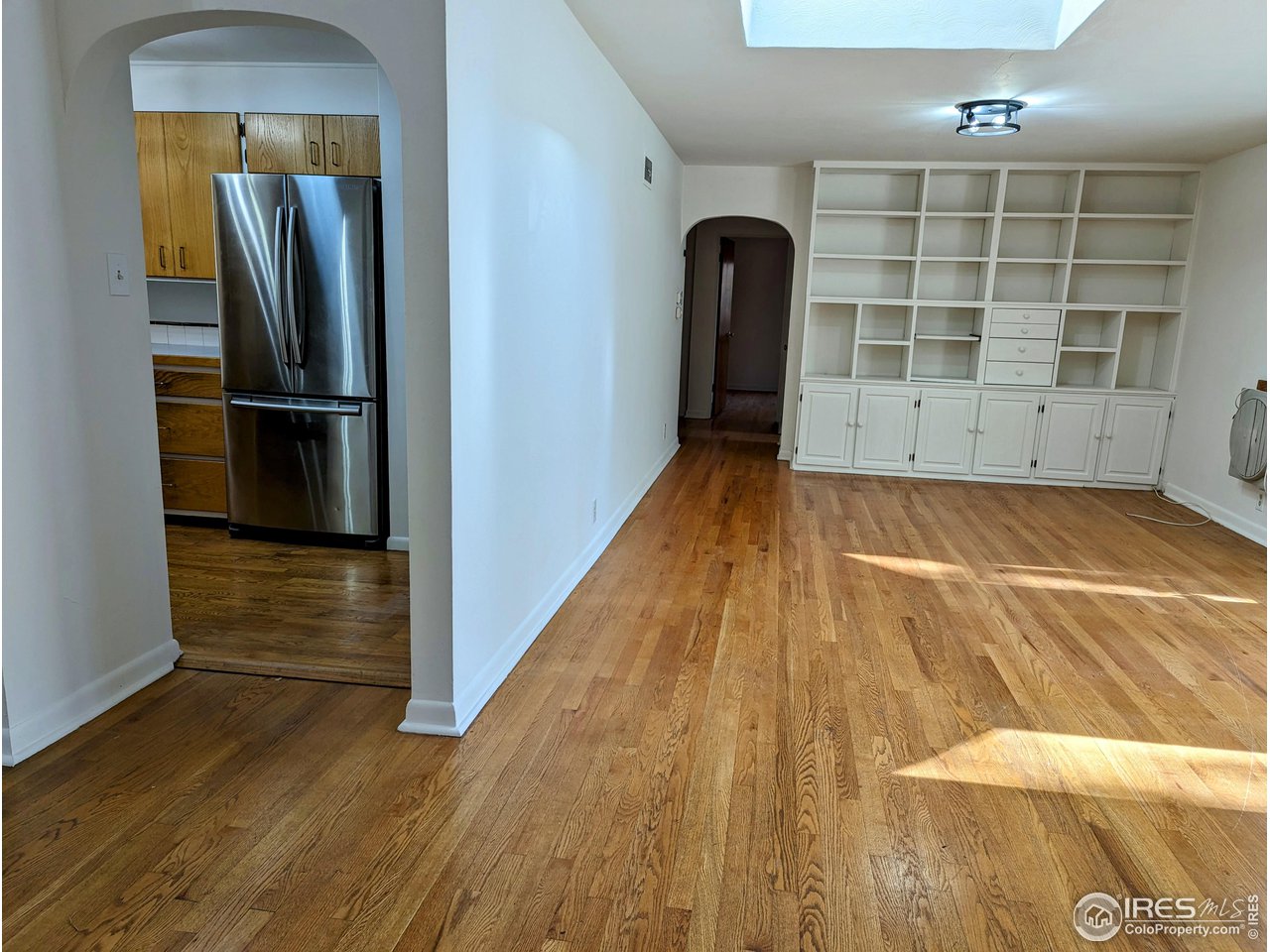 1951 Vista Drive Boulder, CO 80304 - Photo 5 of 35 a view of a hardwood & staircase in a room