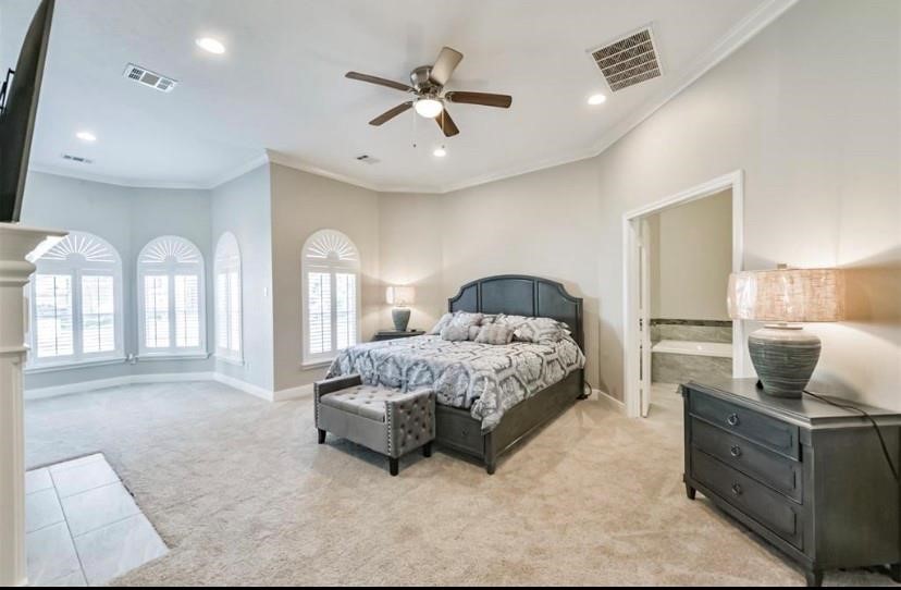 8002 Harbor Point Drive Houston, TX 77071 - Photo 11 of 25 a spacious bedroom with a bed a window and dresser