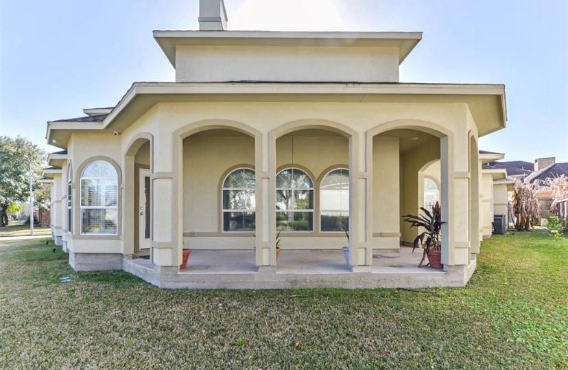 8002 Harbor Point Drive Houston, TX 77071 - Photo 2 of 25 a view of a house with garden