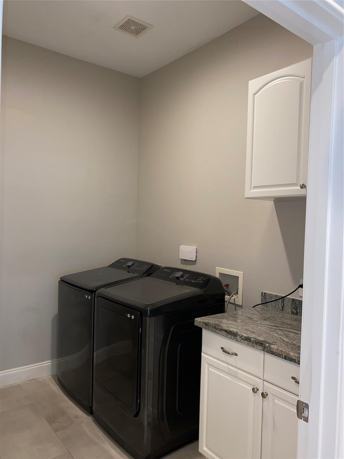 8002 Harbor Point Drive Houston, TX 77071 - Photo 23 of 25 a utility room with dryer and washer