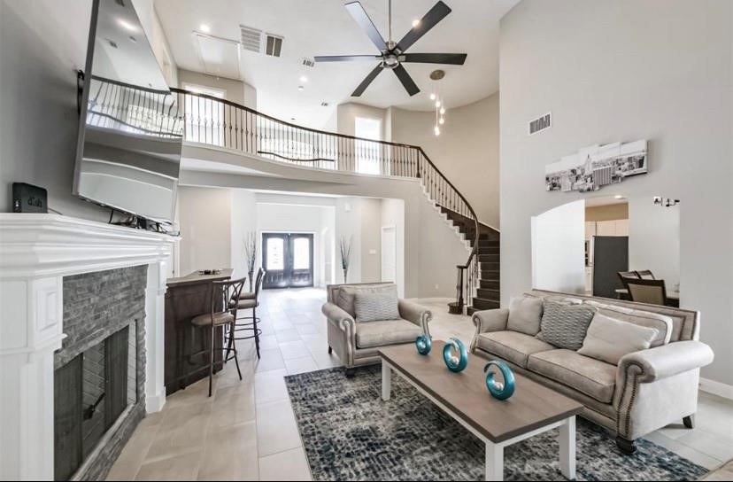 8002 Harbor Point Drive Houston, TX 77071 - Photo 5 of 25 a living room with furniture and a fireplace