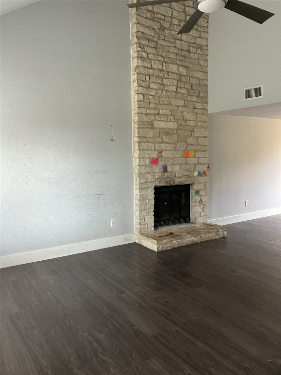 7700 Copperas Drive Austin, TX 78749 - Photo 4 of 14 a view of an empty room with wooden floor and a fireplace