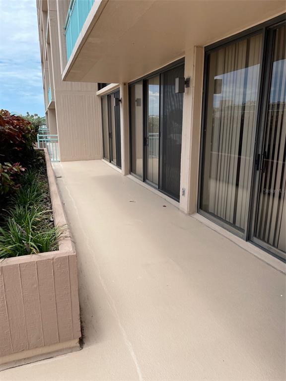 1 Key Capri, Unit 104W Treasure Island, FL 33706 - Photo 15 of 49 a view of balcony with staircase